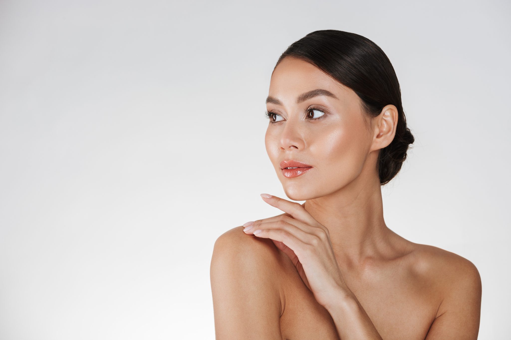 Beautiful woman with radiant, hydrated skin after IV therapy at PUR Skin Clinic