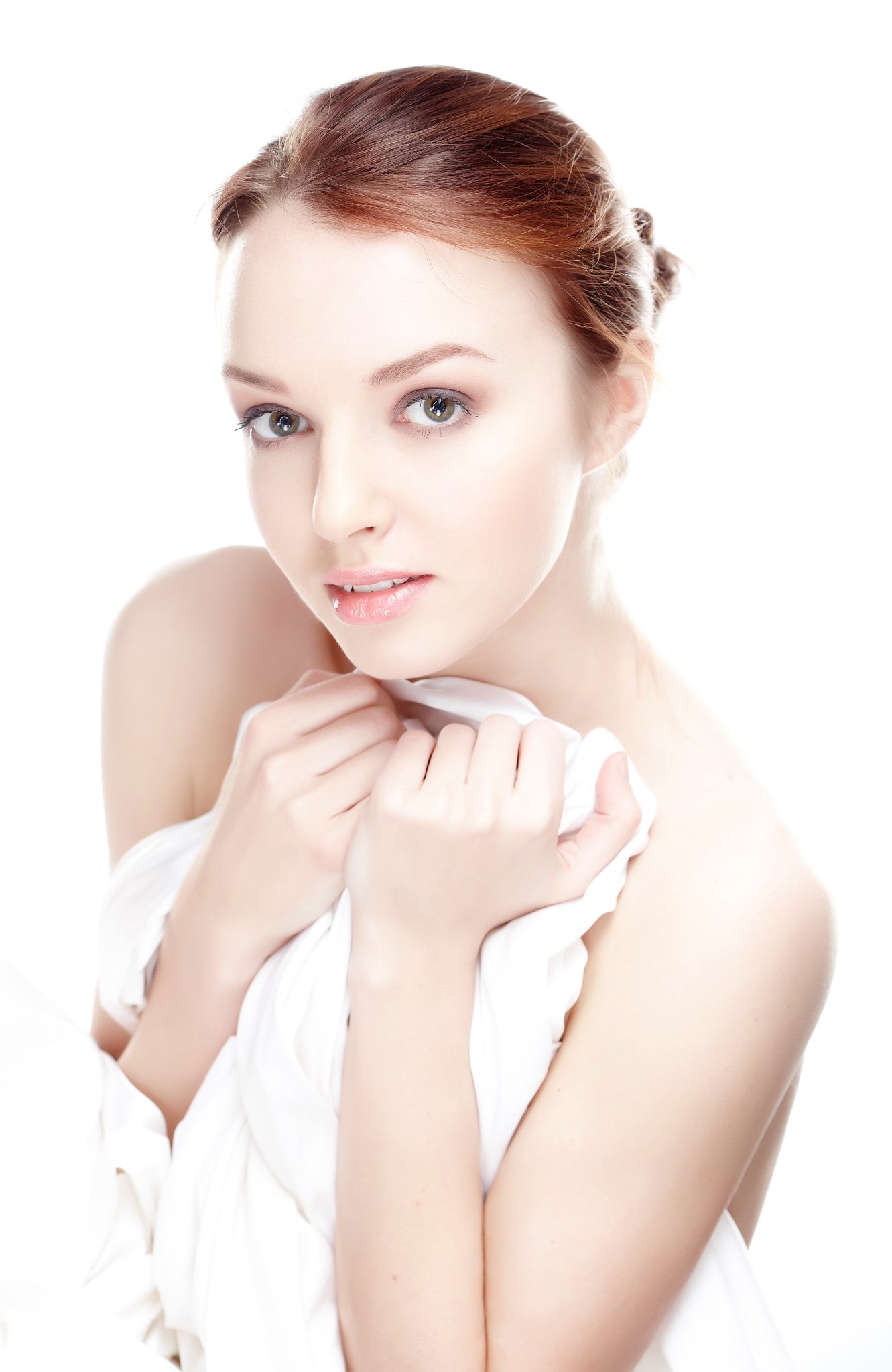 Young woman with clear, radiant skin showcasing results of medical dermatology treatments at PUR Skin Clinic