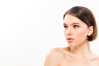 Young woman with smooth, radiant complexion after Fire & Ice facial treatment at PUR Skin Clinic
