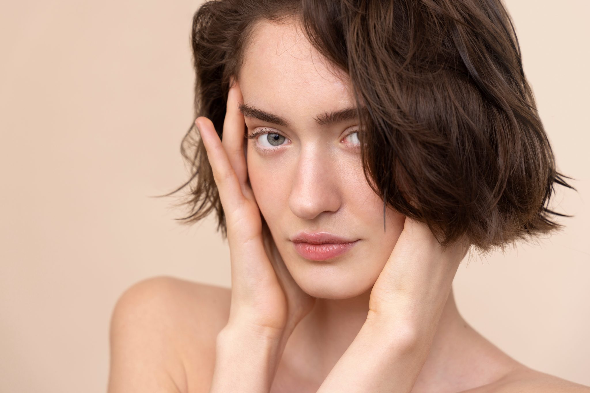 Young woman with smooth, rejuvenated skin after laser skin treatment at PUR Skin Clinic